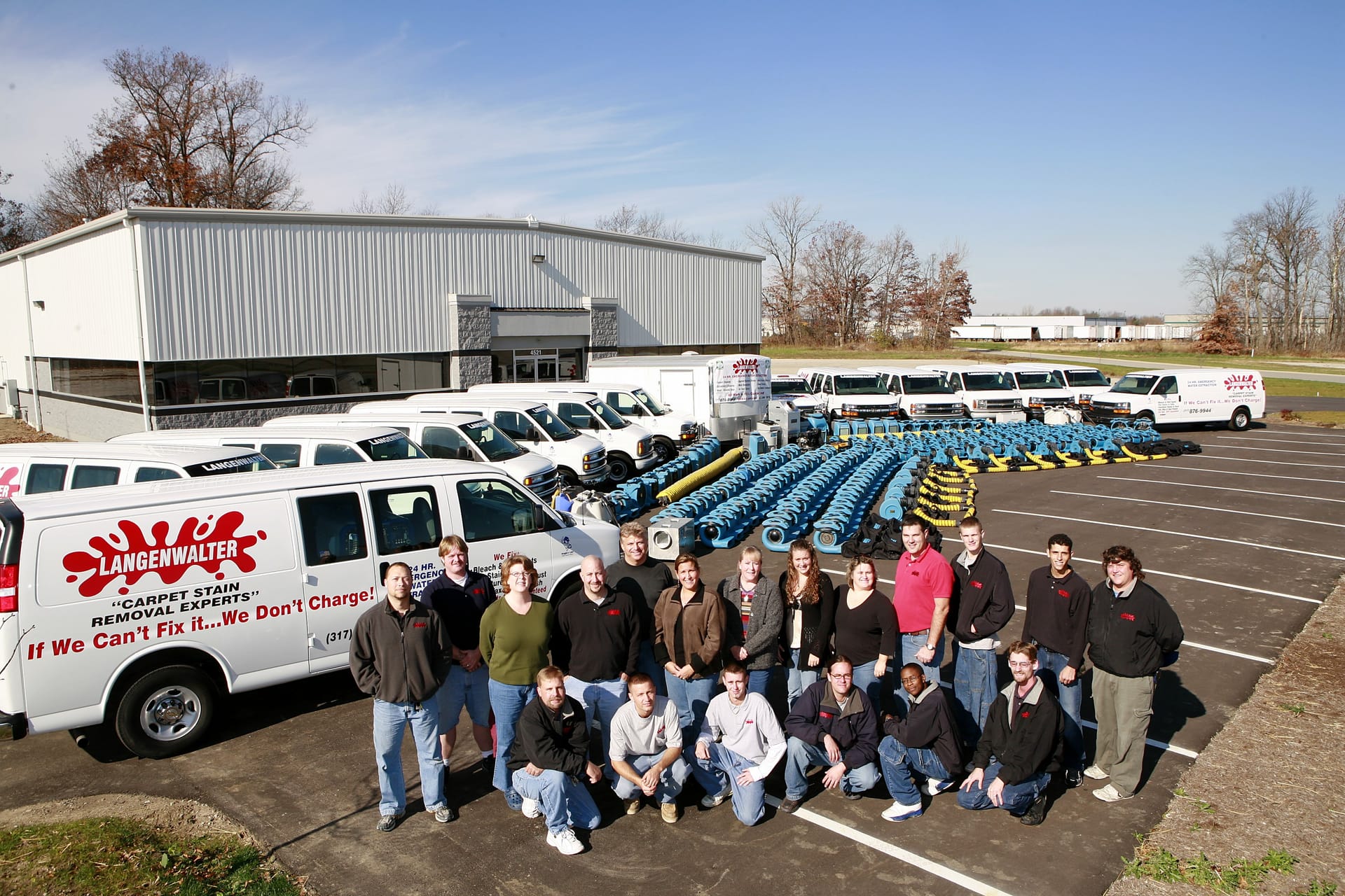 The whole Langenwalter crew with the fleet outside the Carmel shop
